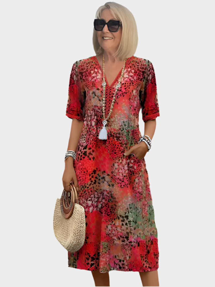 Živé midi šaty s kapsami